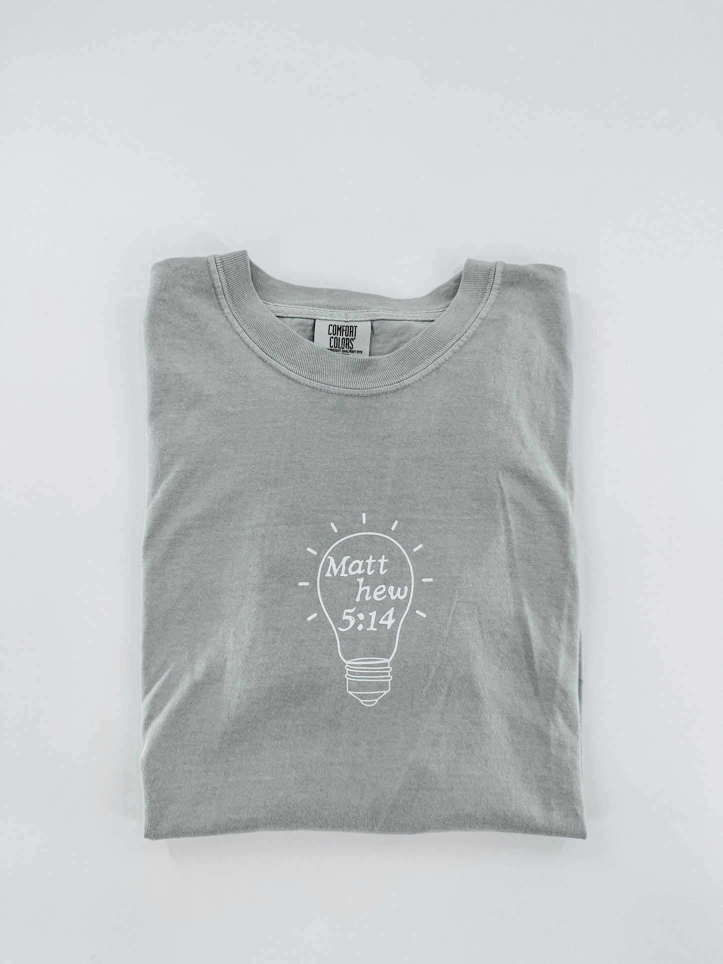 Be the Light Light Bulb Tee